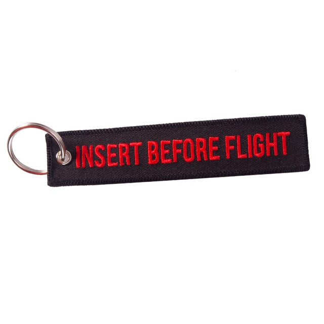Insert Before Flight Black&Red Keytag
